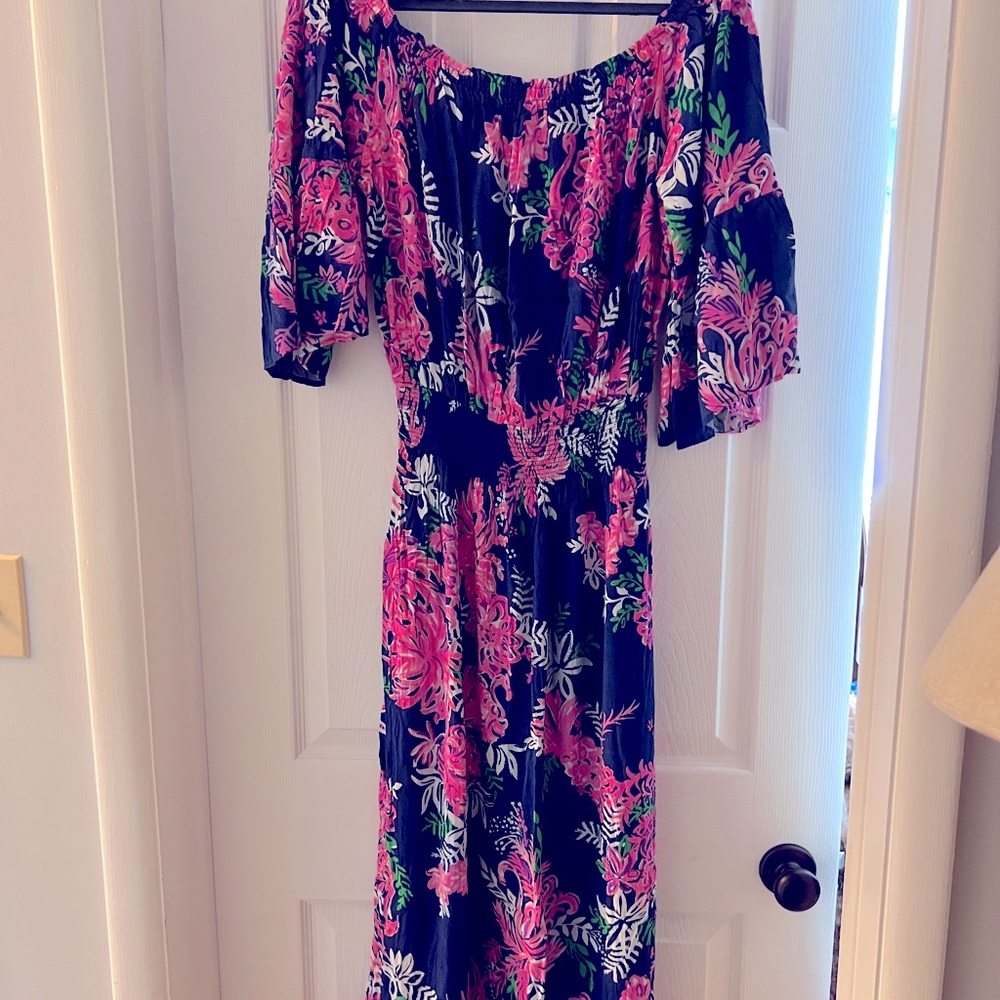 Adorable Lilly midi Dress.Beautiful!Just purchased, a little too snug for me.